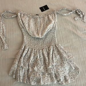 White ditzy floral romper size medium